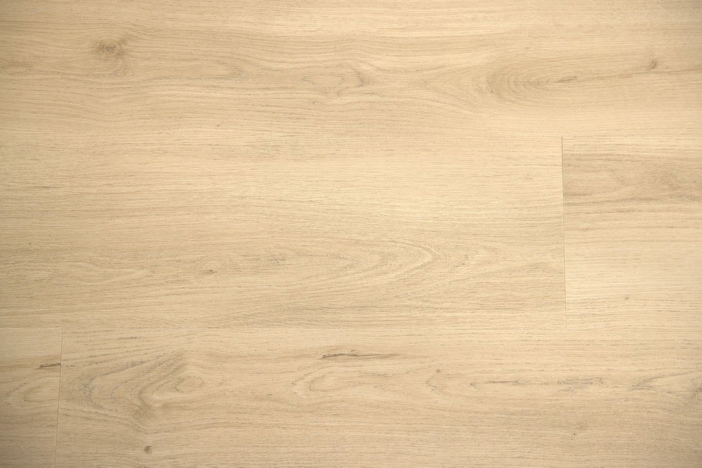 Sunshine Beach Oak luxury vinyl plank, a creamy, sun-bleached oak with light grain, from the Kawana Flooring Coastal Collection