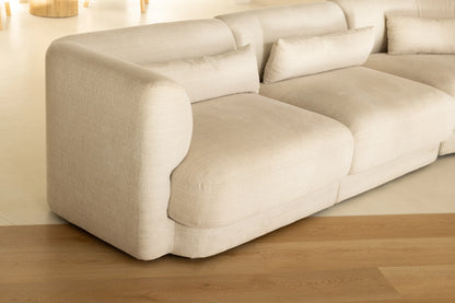 Coastal Collection Bokarina Oak luxury vinyl plank flooring with a cream boucle sofa in a Sunshine Coast living room