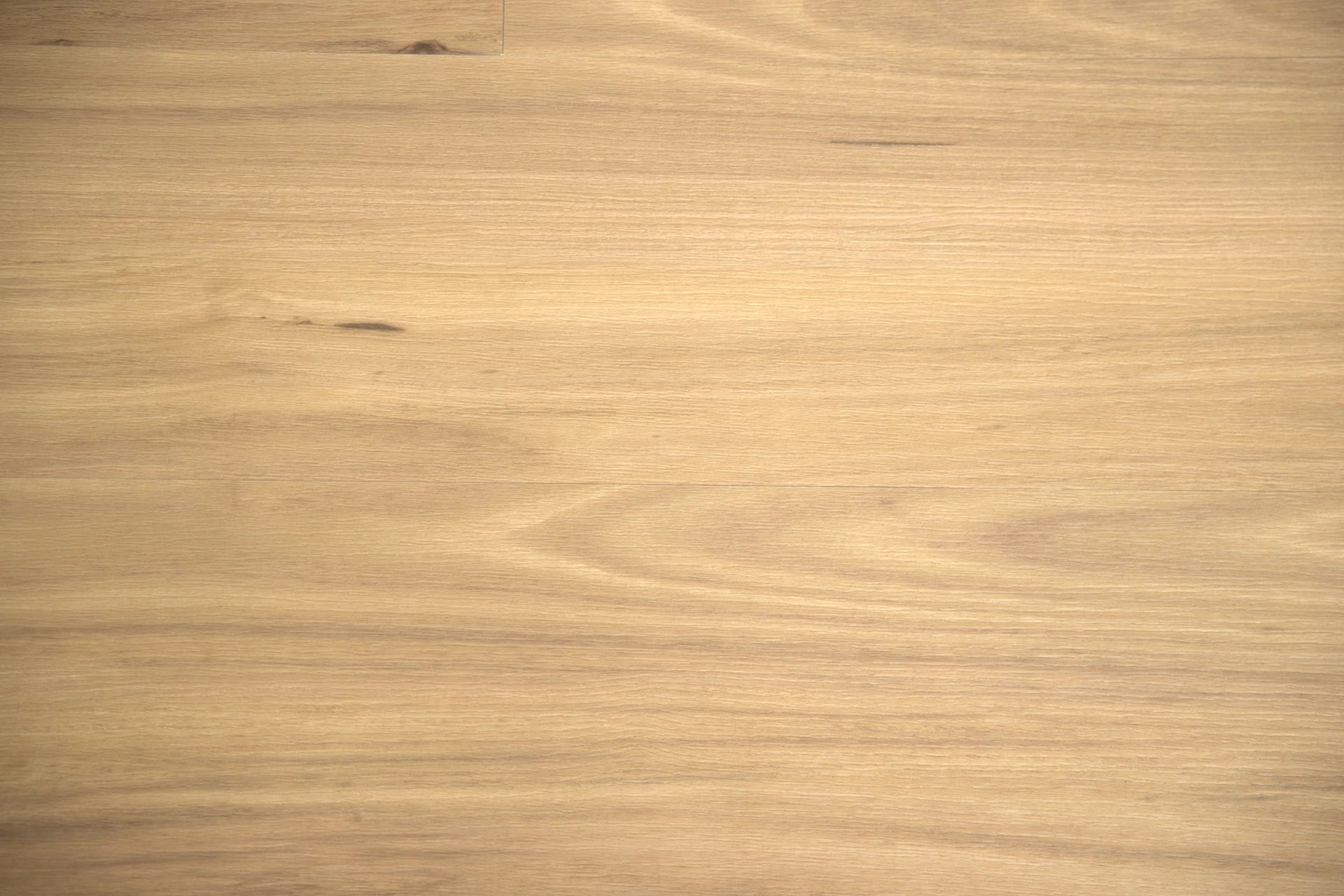 Buderim Blackbutt luxury vinyl plank, a rich golden-brown blackbutt with pronounced grain, from the Kawana Flooring Coastal Collection