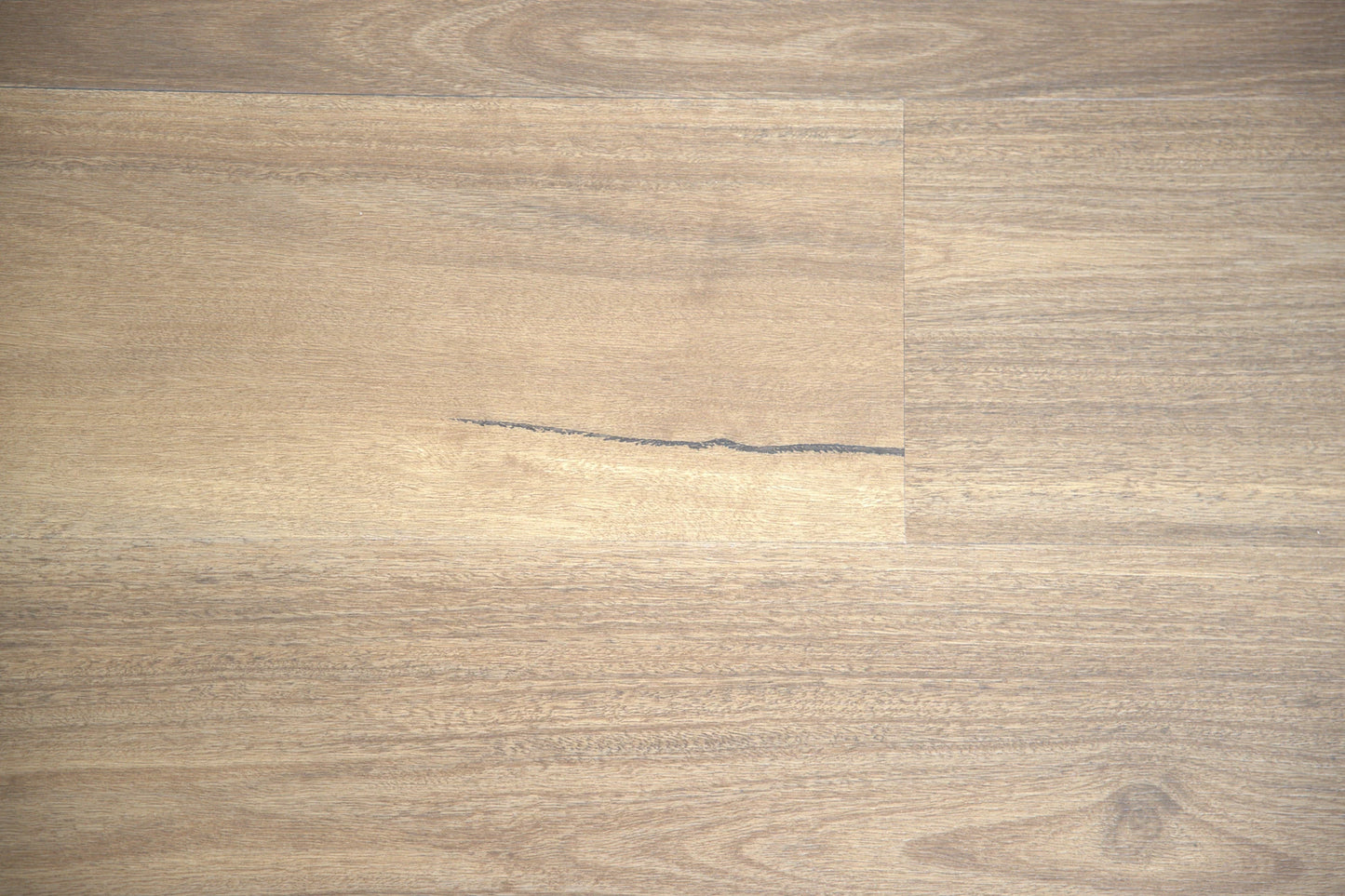 Maleny Spotted Gum luxury vinyl plank, a warm mid-brown with soft grey undertones and natural figure, from the Kawana Flooring Coastal Collection