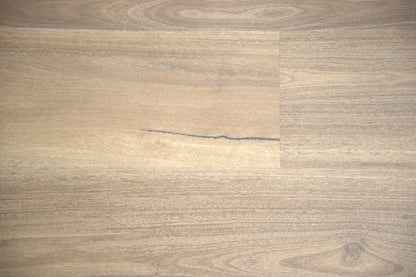Maleny Spotted Gum luxury vinyl plank, a warm mid-brown with soft grey undertones and natural figure, from the Kawana Flooring Coastal Collection