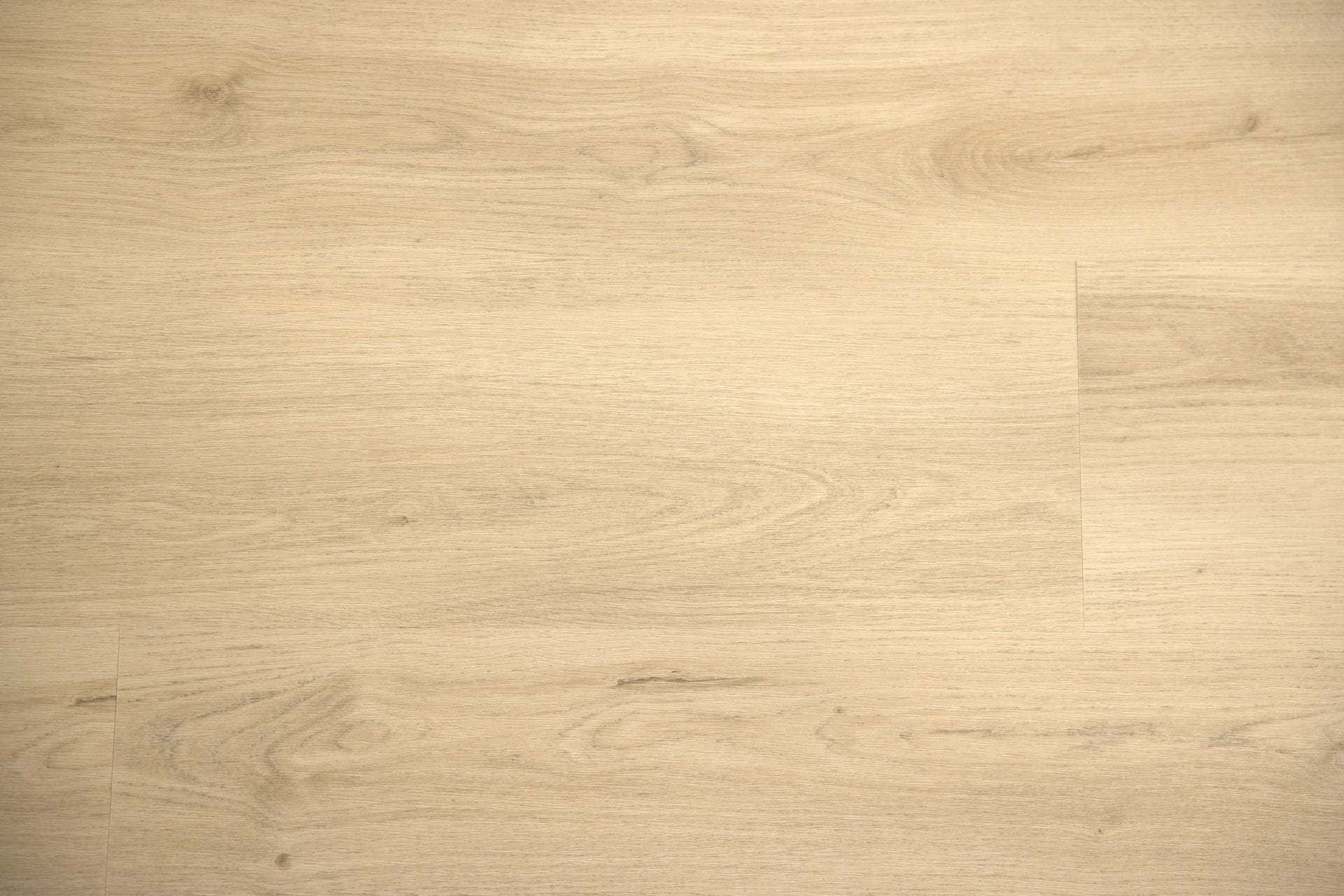 Sunshine Beach Oak luxury vinyl plank, a creamy, sun-bleached oak with light grain, from the Kawana Flooring Coastal Collection