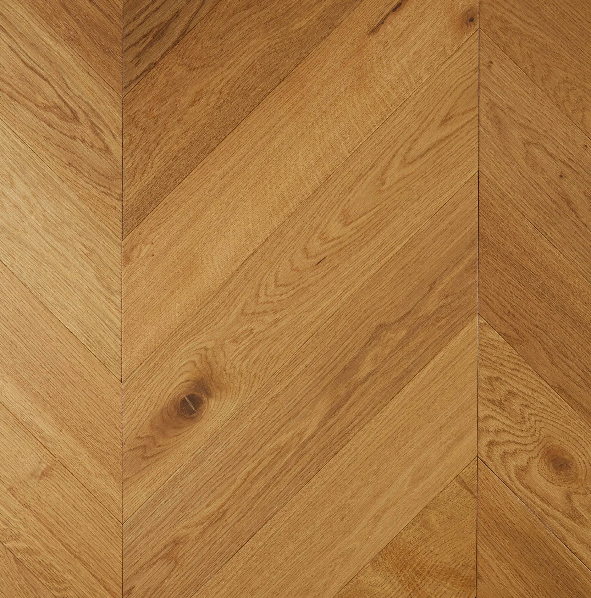 Cognac De Marque Oak Chevron parquetry, pre-finished European Oak with rich warm tan-brown, from the Kawana Flooring De Marque parquetry collection