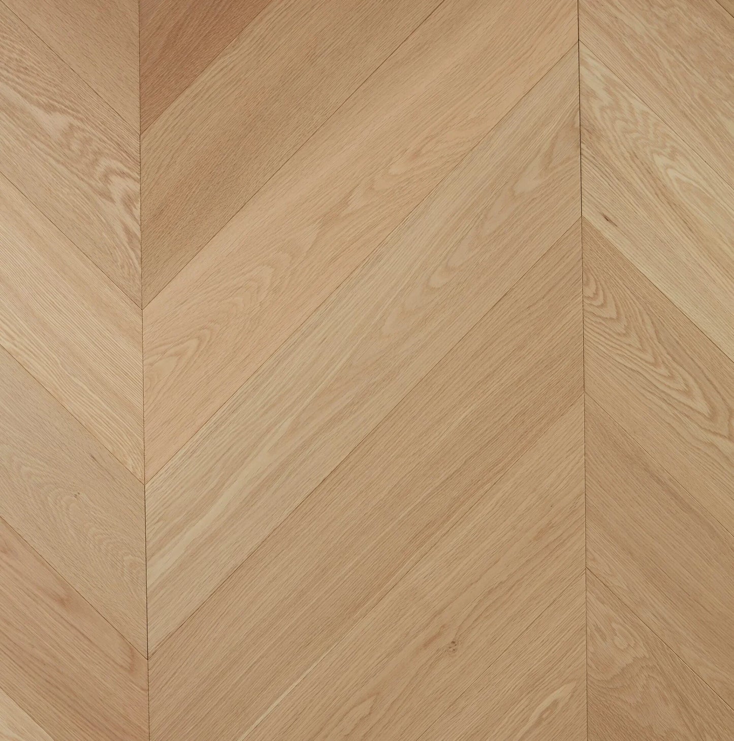 Pure Natural De Marque Oak Chevron parquetry, pre-finished European Oak with natural pale oak tone, from the Kawana Flooring De Marque parquetry collection