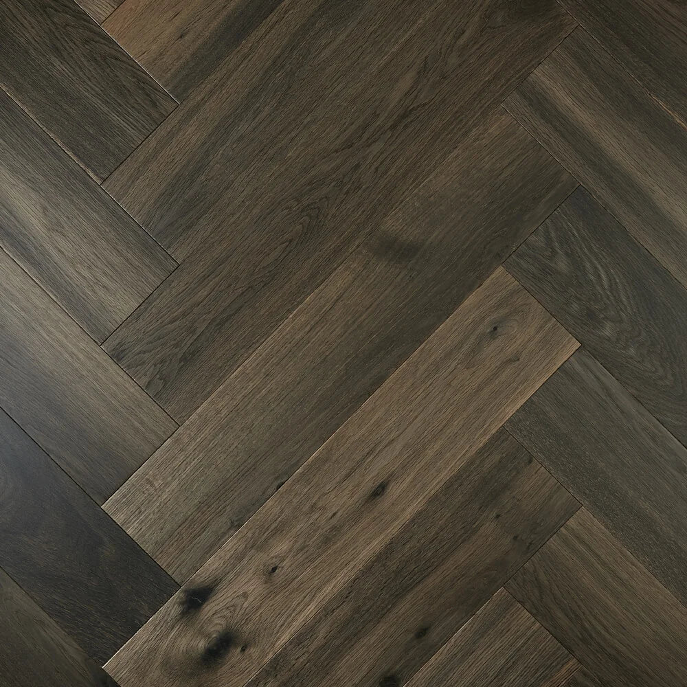Ash Grey De Marque Oak Herringbone parquetry, pre-finished European Oak with deep charcoal-black wash, from the Kawana Flooring De Marque parquetry collection