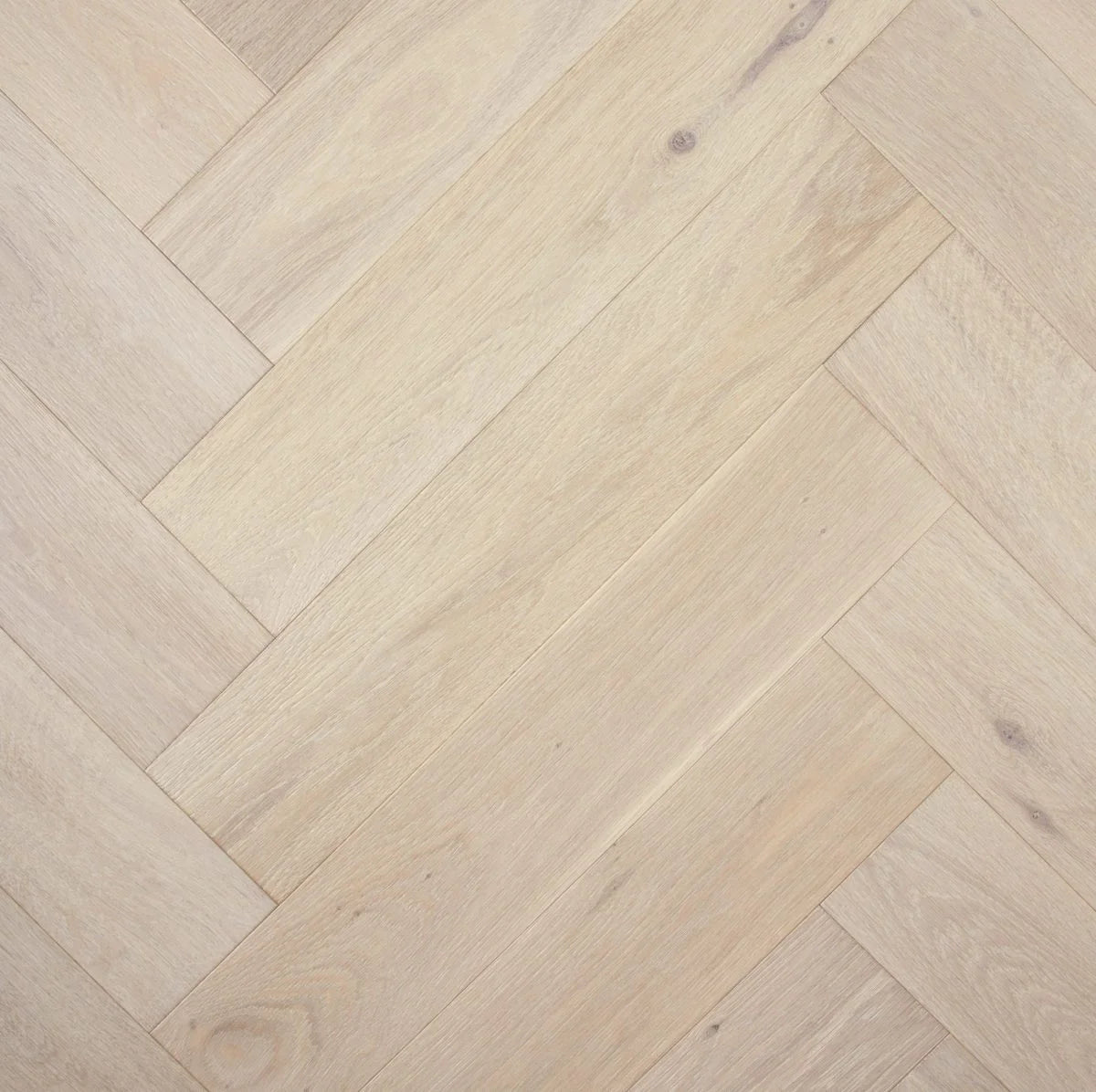 Chateau Grey De Marque Oak Herringbone parquetry, pre-finished European Oak with soft whitewashed pale grey, from the Kawana Flooring De Marque parquetry collection
