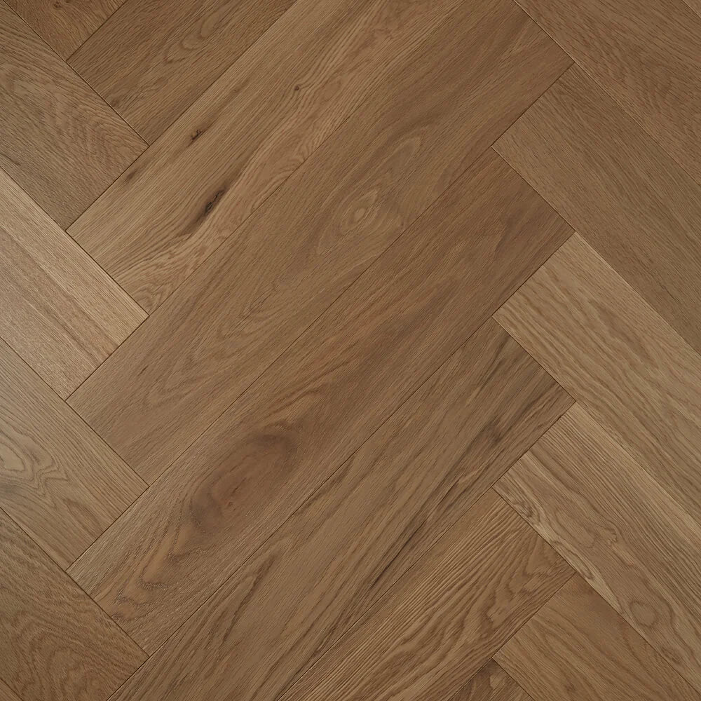 Latte De Marque Oak Herringbone parquetry, pre-finished European Oak with warm milk-coffee tone, from the Kawana Flooring De Marque parquetry collection