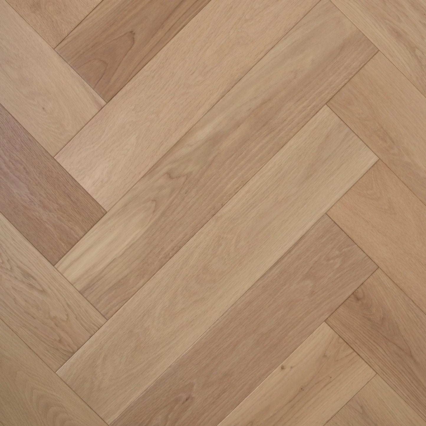 Pure Natural De Marque Oak Herringbone parquetry, pre-finished European Oak with natural pale oak tone, from the Kawana Flooring De Marque parquetry collection