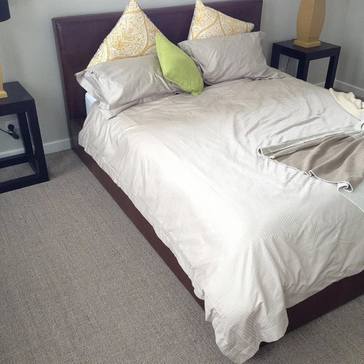 Floorspace Fine Ribbed Granite Sisal in a styled residential interior