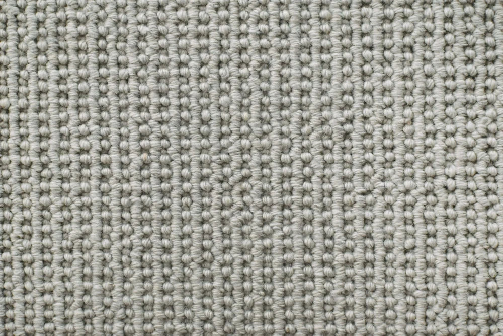 Primer wool textured loop carpet, a deep anchoring grey-charcoal with confident architectural weight and prominent high-low texture, from the Kawana Flooring Victoria Carpets Hatfield collection