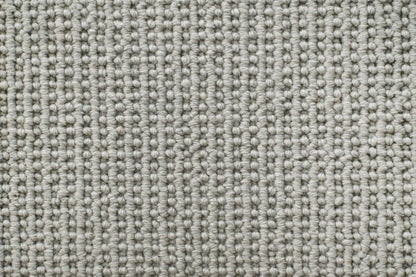 Primer wool textured loop carpet, a deep anchoring grey-charcoal with confident architectural weight and prominent high-low texture, from the Kawana Flooring Victoria Carpets Hatfield collection