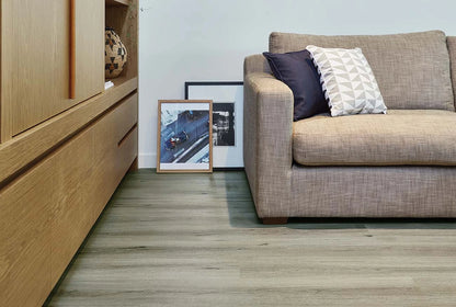 Natural Oak Vinyl Plank Tempest in a contemporary living room with a timber console and beige sofa