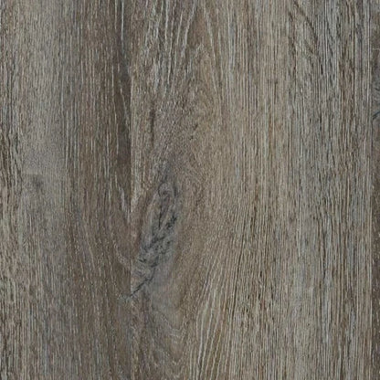 Greystone luxury vinyl plank, a mid grey-brown oak with strong wire-brushed grain texture, from the Kawana Flooring Heartridge Smoked Oak collection