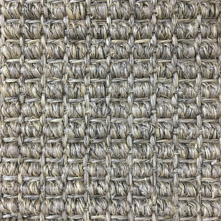 Granite sisal, a multi-tonal grey natural fibre with pronounced ribbed weave, from the Kawana Flooring Floorspace Sisal collection