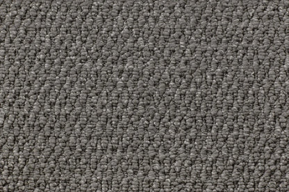 Forum textured loop carpet, a deep architectural near-black with rich historical weight and dramatic sculpted surface, from the Kawana Flooring Victoria Carpets Lucca collection
