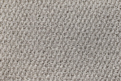 Luminous textured loop carpet, a soft luminous pale neutral with refined gentle character and pronounced architectural surface, from the Kawana Flooring Victoria Carpets Lucca collection