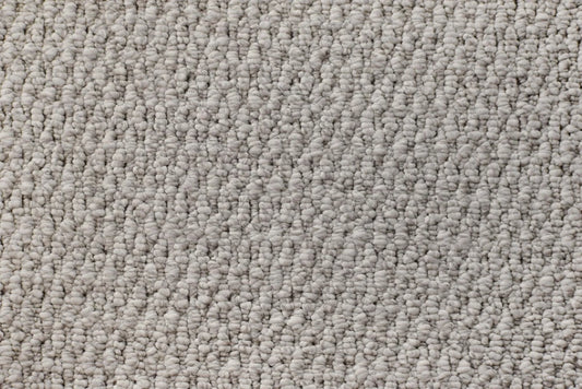 Luminous textured loop carpet, a soft luminous pale neutral with refined gentle character and pronounced architectural surface, from the Kawana Flooring Victoria Carpets Lucca collection