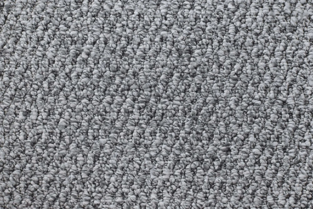 Mosaic textured loop carpet, a balanced cool mid-grey with composed tessellated character and visible architectural texture, from the Kawana Flooring Victoria Carpets Lucca collection