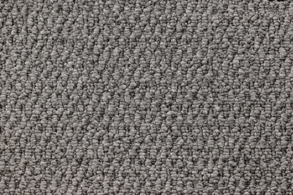 Rampart textured loop carpet, a deep anchoring charcoal with confident architectural weight and dramatic sculpted texture, from the Kawana Flooring Victoria Carpets Lucca collection