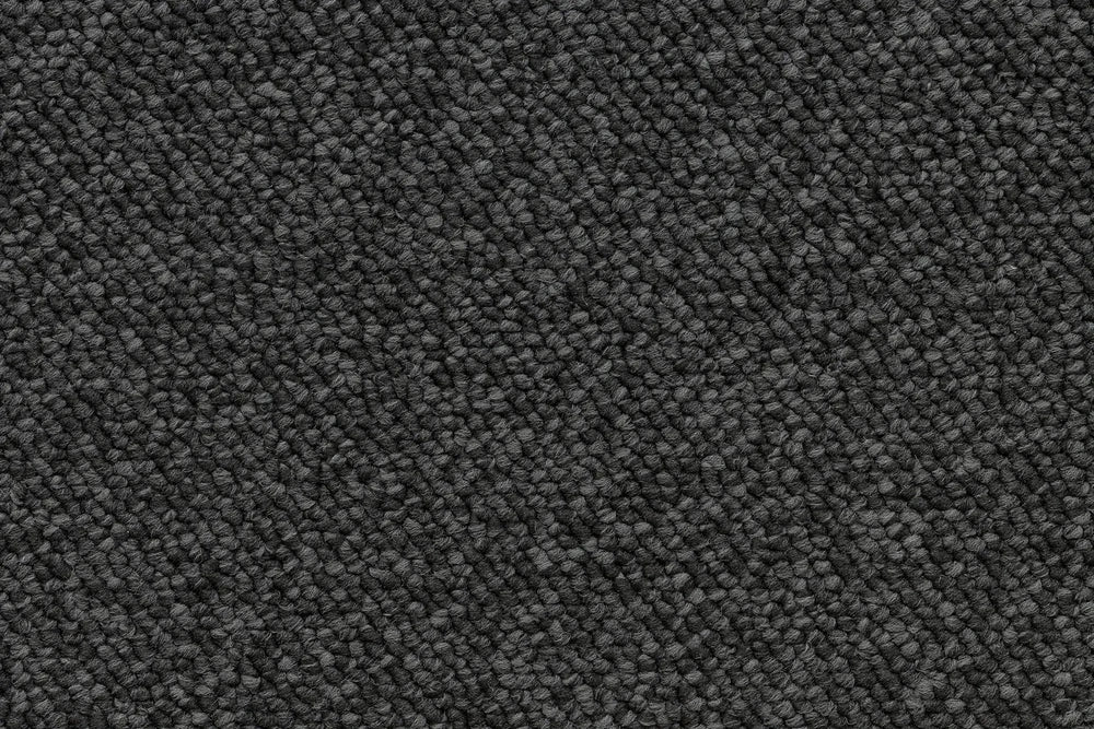 Coal level loop carpet, a deep architectural near-black with dramatic anchoring depth, from the Kawana Flooring Beaulieu Pizazz collection