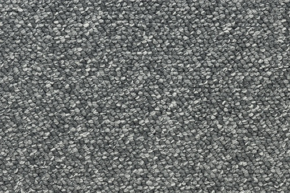 Tungsten level loop carpet, a confident deeper grey with strong architectural character, from the Kawana Flooring Beaulieu Pizazz collection