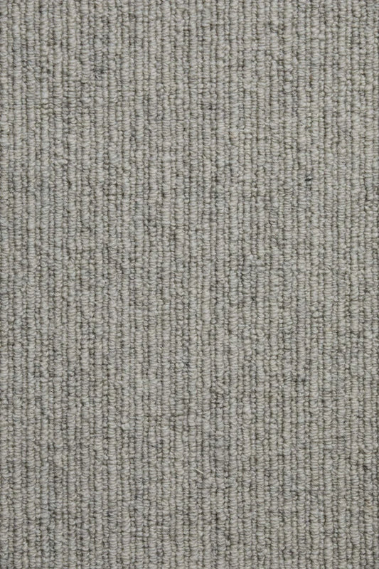 Lacquer wool sisal carpet, a deep architectural near-black with rich shadowed depth and prominent natural-fibre weave character, from the Kawana Flooring Victoria Carpets Urban Weave collection