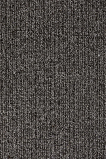 Underground wool sisal carpet, a confident deeper grey with strong urban tonal weight and disciplined woven surface, from the Kawana Flooring Victoria Carpets Urban Weave collection