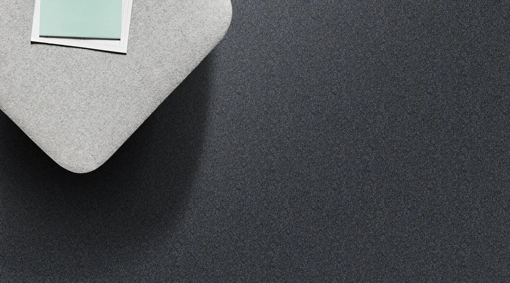 Molten Rock cut pile twist carpet, a near-black charcoal with dramatic tonal weight and densely refined polished surface, from the Kawana Flooring Redbook Velura collection