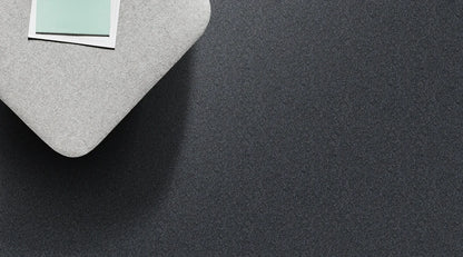 Molten Rock cut pile twist carpet, a near-black charcoal with dramatic tonal weight and densely refined polished surface, from the Kawana Flooring Redbook Velura collection