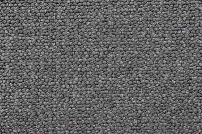 Woodlands level loop carpet, a deep anchoring charcoal with rich shadowed depth and crisp architectural definition, from the Kawana Flooring Victoria Carpets Westbourne Park collection